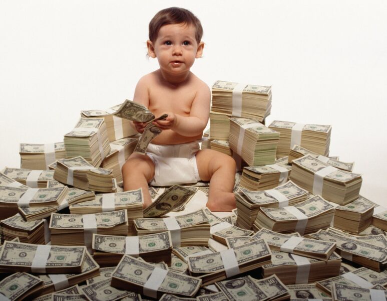 getty-rich-kid-baby-on-money